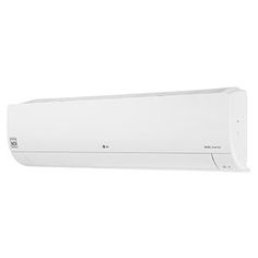 a white air conditioner sitting on top of a wall