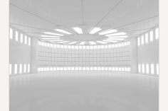 an empty white room with lots of windows