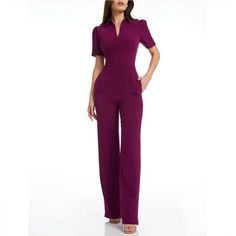 Dress The Population Gloria Collared Zip Neck Short Sleeve Wide Leg Jumpsuit From Dress The Population, This Jumpsuit Features: Stretch Crepe Fabrication Wide Leg Silhouette Collared Zip Neckline Short Cap Sleeves Front Zip Closure Approx. 62.5" Length Polyester/Spandex Machine Wash/Line Dry Imported. Approx Measurements Pit To Pit 20" Length62.5 New To Poshmark Sign Up With My Code Nandolov And Save $10 On Your First Order. Tailored Jumpsuits And Rompers For Office, Elegant Short Sleeve Jumpsuits And Rompers For Office, Fitted Evening Pantsuit With Pockets, Evening Fitted Pantsuit With Pockets, Elegant Fitted Jumpsuits And Rompers With Pockets, Fitted Jumpsuits And Rompers For Work, Chic Short Sleeve Workwear Pantsuit, Chic Short Sleeve Pantsuit For Work, Chic Short Sleeve Jumpsuit For Office