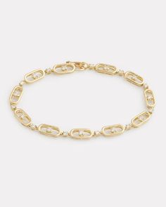 18K Yellow Gold Diamond Oval and Round Link Bracelet, .91 TCW6 7/8 Inches Style# YBOPWD Timeless Oval Yellow Gold Diamond Bracelet, Timeless Yellow Gold Oval Diamond Bracelet, Modern Yellow Gold Oval Diamond Bracelet, Oval Diamond Gold Bracelet With Jubilee Design, Luxury Oval 14k Gold Chain Bracelet, Luxury 14k Gold Oval Chain Bracelet, Luxury Gold Oval Tennis Bracelet, Luxury 14k Gold Oval Diamond Bracelet, Elegant Oval Bracelets With Solid Link Construction