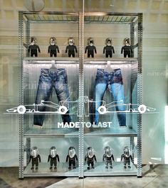 a display case filled with lots of different types of clothes