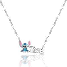 a necklace with the word zoo on it and an image of a cartoon character in blue