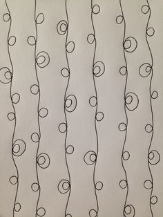 a drawing of black and white lines with circles on them