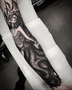 a person with a tattoo on their arm