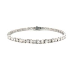 Elevate any outfit with our stunning 5.83 Cts Natural Diamond Tennis Bracelet. Featuring 5.83 carats of natural diamonds, this bracelet is designed to add a touch of luxury and elegance to your wardrobe. Make a statement and feel confident with every wear. DIAMOND 5.83 RD TCW 57 PCS. H-I VS118K WG 8.96 GRAMS SIZE 7" MD-034 Elegant White Tennis Bracelet With Single Cut Diamonds, Luxury White Diamond Bracelet With Brilliant Cut, White Diamond Bracelet For Everyday Luxury, Elegant White Diamond Tennis Bracelet, Luxury Diamond Tennis Bracelet For Formal Occasions, Luxury White Diamond Round Cut Bracelet, Luxury White Round Cut Diamond Bracelet, Luxury White Tennis Bracelet, Exquisite White Diamond Tennis Bracelet