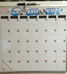 a calendar with snowmen on it is displayed