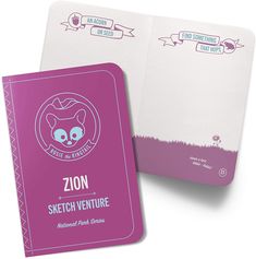 the front and back of a pink notebook with an image of a cat on it