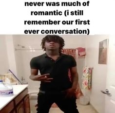 a man standing in a bathroom next to a sink and toilet with the caption'never was much of romantic i still remember our first ever conversation