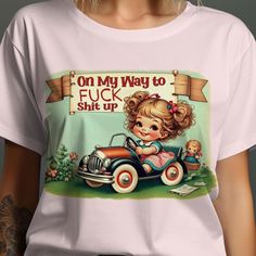 This Vintage Retro Humor T-Shirt features a cute design with a funny statement "On My Way to F Sh** Up". Perfect for those who love unique and quirky graphic shirts that make a bold statement. This casual fun tee is great for everyday wear or as a gift for someone with a great sense of humor. Product Features: Fabrication: 100% Airlume combed and ring-spun cotton, 32 single 4.2 oz. (Ash - 99% Airlume combed and ring-spun cotton, 1% poly) Seams: Side-seamed Fit: Retail Fit Sizing: Unisex Sizing L Vintage Fitted T-shirt With Funny Print, Cheap Retro T-shirt With Funny Print, Vintage Cotton T-shirt With Funny Text, Retro Cotton T-shirt With Funny Print, Retro Relaxed Fit T-shirt With Funny Text, Funny Statements, Statement Tshirt, Retro Humor, Cool Tees