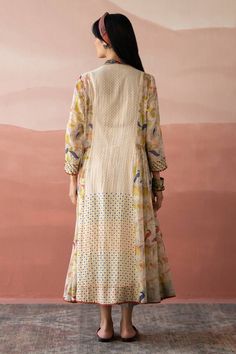 White kurta with bandhani and floral hand block print, sequins and beaded hand embellishments and pintucked detailing. Comes with a slip. - Aza Fashions White Mulmul Kurta With Bandhani Print, White Anarkali Kurta With Bandhani Print, Anarkali White Kurta With Bandhani Print, Bohemian Straight Kurta With Cutdana, Bohemian Kurta With Cutdana For Transitional Season, White Anarkali Set With Bandhani Print, Wedding Kurta With Block Print For Navratri, Navratri Wedding Kurta With Block Print, White Bandhani Print Semi-stitched Kurta