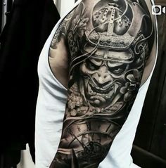 a man with a tattoo on his arm