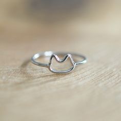 This ring features a cute cat face outline connected by a slender sterling silver band. Great for stacking or everyday wear. ✩ Sterling silver cat face is 8mm wide; sterling silver band is 1.5mm. Choose from a US size 5, 6, 7 or 8. All components are sterling silver. ✩ Comes beautifully packaged as shown in a branded box with care instructions. If this is intended as a gift, please let us know when you check out...that way we can include a blank gifting card for you! ~ Please be sure to read my Cat Rings Jewelry, Silver Cat Ring, Face Outline, Owl Cat, Cute Cat Face, Gold Vermeil Jewelry, Sterling Silver Cat, Cat Ring, Baby Jewelry