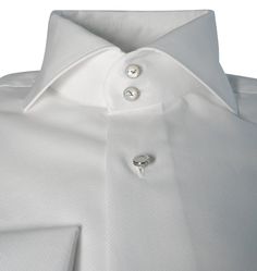 Our signature tuxedo dress shirt is something that has broken the internet. In a world where features like this are only found in custom shirts, we have decided to create a collection that delivers the same value without having to get measured and pay a hefty price. These shirts will give you that bold look! Never worry again about your collar sliding inside your jacket or not being even. No need for collar stays either! You will be addicted to your new shirts! Quality Details: White True to siz Designer Formal Tops With Button Cuffs, Luxury Formal Tops With Covered Buttons, Designer Fitted White Shirt, Luxury Fitted Tops For Business, Classic Formal Tops With Covered Buttons, Elegant Fitted Shirt With Covered Buttons, Luxury Slim Fit Tops For Formal Occasions, Luxury White Shirt With Concealed Placket, Luxury Formal Shirt With Hidden Button Closure