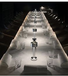 a long table with many glasses on it