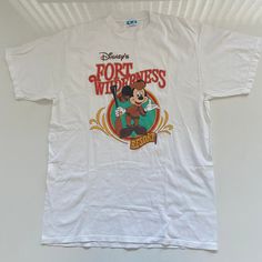 Vintage Disney Fort Wilderness Resort Mickey Mouse Logo T-Shirt Mens Large Size: Adult Large Pit To Pit: 20.5 Inches Length: 29 Inches Has A Small Stain Otherwise Item Is In Good Used Condition You Can Find More Totally Rad Items Like This In My Poshmark Closet! Walt Disney Character Fashions Fort Wilderness Resort Mickey Mouse Tee Spell Out Logo Vintage Vtg Retro Rare 90s 80s Theme Park Amusement World Land Florida Animal Streetwear Mom Dad Souvenir Gift Camping Classic Vibes Cartoon Fun Huntin Mens Vintage Disney Shirt, Playful Cartoon Print T-shirt For Disney Trips, Disney Fort Wilderness Resort, Mouse Logo, Vintage Disney Shirts Hot Topic, Fort Wilderness Disney, Retro Mickey Mouse Crew Neck T-shirt, Fort Wilderness, Trendy Mickey Mouse Short Sleeve T-shirt