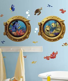 the little mermaid wall decals are in an ocean themed bathroom with fish and bubbles