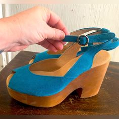 Brand New Platform Wooden Clogs. Free People Brand Petrol Blue Suede Buckles Around The Ankle Size 37/7. Heel Height 4” Platform Lift 1.3” Retails $300 Blue Clogs With Wooden Heel For Summer, Blue Platform Clogs For Summer, Blue Open Toe Clogs With Removable Insole, Blue Sandals With Wooden Heel For Spring, Blue Open Toe Heels With Wooden Heel, Casual Blue Clogs With Wooden Heel, Blue Clogs With Wooden Heel And Round Toe, Blue Closed Toe Clogs With Removable Insole, Blue Casual Sandals With Wooden Heel