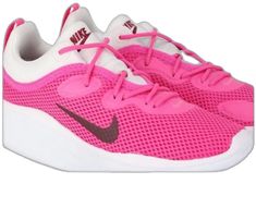 Nike Sneakers For Spring Jogging, Pink Perforated Sneakers For Spring, Sporty Pink Running Shoes With Perforations, Pink Running Shoes With Perforations, Pink Synthetic Sneakers, Pink Synthetic Sneakers With Laces, Casual Pink Running Shoes With Perforations, Pink Lace-up Running Shoes With Rubber Sole, Pink Synthetic Sneakers For Running