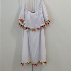 Fun Off The Shoulder Dress With Tassels And Pom Pom’s! Size Medium By Pinc Premium! Never Worn! No Trades. Smoke And Pet Free Home. Fun White Cotton Dress, Playful White Sundress For Beach, Playful White Sundress For Summer, Casual White Tassel Dress, Casual White Dress With Tassels, Cute White Sundress For Parties, Fun White Summer Dresses, Fun White Beach Dress, White Tassel Mini Dress For Beach