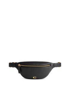 a black fanny bag with gold zippers on the front and side, sitting against a white background