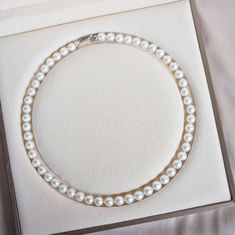 8-9mm AAA Chinese White Akoya Cultured Pearl Necklace This popular necklace design features AAA quality, round Chinese Akoya pearls measuring 8-9mm. Material: Chinese Akoya pearls in a silver clasp. What you see is what you get. To differ from those over-photoshopped images other products use, we take separate photographs of each piece of jewelry to present its actual quality. We promise: that what you see in the product photo is what you are receiving. Product Information Pearl Type Chinese Ako Single Strand Round Pearl Necklace Gift, Single Strand Round Pearl Necklace As Gift, Single Strand Pearl Necklace Gift, Luxury Round Pearl Chain Necklace, Adjustable Round Pearl Necklace, Luxury White Pearl Necklace With Sterling Silver Clasp, Classic Formal Pearl Necklace With 8mm Beads, Classic 8mm Bead Pearl Necklace For Formal Occasions, Luxury Pearl Necklace With Round Beads For Gifts