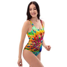 🦚This Women's One-Piece Swimsuit/Bathing Suit for all figures will bring out your best features. Enjoy the smooth fabric and the Unique Colorful Peacock Jeweled Design, and show it off by the beach or pool! * 82% Polyester, 18% Spandex * Fabric weight: 6.78 oz/yd² (230 g/m weight may vary by 5% * Chlorine-resistant fabric * Cheeky fit with a scoop neckline and a low scoop back * Zig-zag stitching * Double-layer front  * Four-way stretch material stretches and recovers on the cross and lengthwise grains Refer to Sizing Chart above in Photo Section Our Other One-Piece Swimsuits: https://www.etsy.com/shop/zazzfashion/?etsrc=sdt&section_id=45551037 Tropical Multicolor Bodysuit For Pool, Tropical Multicolor Bodysuit For The Beach, Fitted Multicolor One-piece For Sunbathing, One-piece Swimwear For Summer Festival, Multicolor Beachwear One Piece For Swimming, Multicolor One-piece Bodysuit For The Beach, Multicolor Beachwear Bodysuit For Beach, Multicolor Tropical One-piece Swimwear, Summer Multicolor One-piece Bodysuit