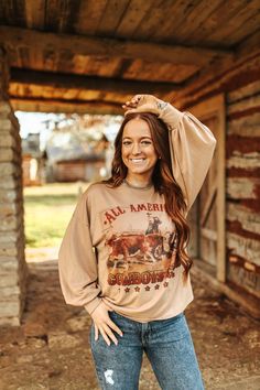 Saddle up in style with our "Cowboy Sweatshirt"! 🤠🌵 Crafted for comfort and designed for the rugged spirit, this sweatshirt is perfect for cowboys and cowgirls alike. Made from soft, cozy fabric, it's ideal for chilly days and nights around the campfire. 🔥 Emblazoned with a bold cowboy design, this sweatshirt adds a touch of Western flair to any outfit. Whether you're out on the ranch or exploring the urban frontier, you'll feel like a true cowboy or cowgirl in this stylish outerwear. 🐎 With Western Style Relaxed Fit Long Sleeve Tops, Western Style Long Sleeve Relaxed Fit Tops, Long Sleeve Tops For Rodeo In Winter, Long Sleeve Top For Ranch In Fall, Western Style Relaxed Fit T-shirt For Fall, Western Brown Tops For Winter, Brown Western Tops For Winter, Brown Western Style Top For Winter, Country Style Cotton Tops For Fall