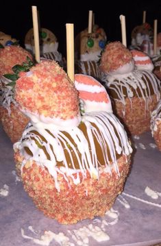 there are many desserts that have been made to look like strawberries on sticks