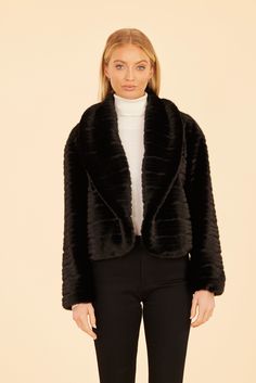 Add a luxe element to your fall outfits with our Faux Mink Grooved Jacket, an opulent yet guilt-free alternative to real mink. This jacket’s grooved design adds a modern twist, while the wide lapels and single-button closure create a sophisticated silhouette. Soft and plush, the faux mink offers all the warmth and elegance without compromising on ethics, making it perfect for chilly autumn days. Faux mink fur Single-button closure Wide lapels Grooved texture Available in Black, Brown, Grey, and Evening Faux Fur Coat For Fall, Fall Evening Faux Fur Coat, Luxury Faux Fur Outerwear For Evening, Mink Colored Long Sleeve Evening Outerwear, Chic Formal Fur Coat With Faux Fur Lining, Evening Faux Fur Outerwear For Fall, Elegant Faux Fur Outerwear For Work, Long Sleeve Faux Fur Evening Outerwear, Long Sleeve Faux Fur Outerwear For Evening