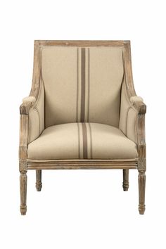 an upholstered chair with striped fabric on the back and arms, in beige