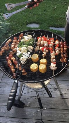 a grill with several different types of food on it