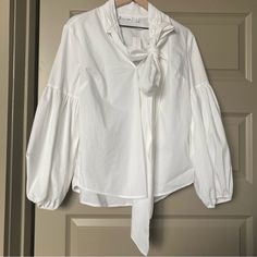 New With Tags New York & Company White Shirt Blouse Puff Bell Sleeves With Bow Collar On Neck Long Sleeves Office, Career Professional 7th Avenue Design Studio Size: Large 60% Cotton 35% Polyester 5% Spandex Avenue Design, White Shirt Blouse, Bow Collar, White Blouse, White Shirt, Bell Sleeves, Design Studio, Shirt Blouses, Career