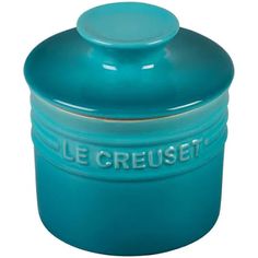 a blue casserole with the words le creuset written on it