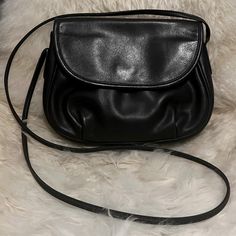 Great Vintage Condition With Minor Signs Of Wear. Clean Inside And Out. No Odors. A Trendy Cute Little Bag Perfect For Holding Your Wallet, Cellphone And Keys. Thanks For Looking. Vintage Black Soft Leather Bags, Coach Black Crossbody Shoulder Bag, Coach Soft Leather Shoulder Bag For Evening, Black Crossbody Saddle Bag For Shopping, Vintage Black Shoulder Bag With Dust Bag, Coach Evening Crossbody Bag, Coach Black Flap Bag For Everyday Use, Black Coach Flap Bag For Everyday Use, Crossbody Saddle Bag