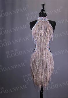 a dress on a mannequin with beads