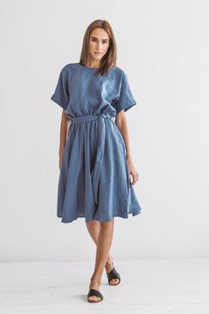 "DESCRIPTION: ♥ 100% natural European linen; ♥ safe Oeko-TEX® Standard 100 certified linen fabric ♥ softened midweight linen (185 g/m2) ♥ wide skirt dress with short sleeves ♥ with belt ♥ with pockets FIT ♥ length from the lower to the upper seam is about 43.3 inches / 110 cm ♥ measurements taken from a size S ♥ model is 173 cm and wearing a size S SIZE CHART: XS: Bust 30.7\"- 32.7\" (78-83 cm) , Waist 23.6\"- 25.6\" (60-65 cm), Hips 33.5\"- 35\" (85-89 cm) S: Bust 33\"- 35\" (84-89 cm) , Waist Flowy Linen Casual Midi Dress, Spring Flowy Linen Midi Dress, Flowy Linen Midi Dress Casual Style, Spring Linen Dress In Flax Color With Short Sleeves, Spring Short Sleeve Flax Linen Dress, Linen Midi Dress For Daywear, Belted Linen Midi Dress For Daywear, Linen Tie Waist Dress For Daywear, Linen Midi Dress With Tie Waist