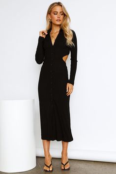 Length from shoulder to hem of size S: 130cm. Black maxi dress. Non-lined. Cold hand wash only. Model is a standard XS and is wearing size XS. True to size. Lightweight, stretchy ribbed fabric. Buttons down the front. Backless. Collars. Slip-on style. Rayon/Spandex. Love that professional vibe but want to have some fun with it? Well, the Polo Fantasies Maxi Dress is your perfect fix. The dress is all business at the front with collars, buttons all the way down and long sleeves, turn it around to Gold Block Heels, Collar Dresses, Bodycon Dress Formal, Red Slip Dress, Party Rompers, Long Sleeve Dress Formal, Fabric Buttons, Maxi Dress Black, French Women