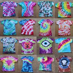 tie - dyed shirts laid out on the ground