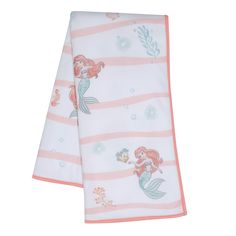 the little mermaid blanket is laying on top of it's back legs and has pink stripes