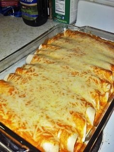 a casserole dish with cheese on top in the oven