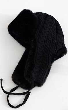 Whether you call these bad boys trapper hats, Russian hats, earflap hats or trooper hats - we know one thing - they warm AF! Keep your head wintergoth cosy in this faux fur woolly hat with extended earflaps on the side and woven black ties. A cable knit pattern on the back gives some granny chic glam and the fur shows on the underside of the sides and along the top brim One size fits most. Winter Outdoor Bonnet With Ear Flaps, Warm Faux Fur Hats With Ear Flaps, Warm Black Bonnet For Winter, Warm Hats With Ear Flaps For Cold Weather, Windproof Winter Hats With Ear Flaps, Warm Winter Hats With Ear Flaps, Warm Beanie With Ear Flaps, Winter Beanie With Ear Flaps, Black Hat With Faux Fur Lining And Ear Flaps