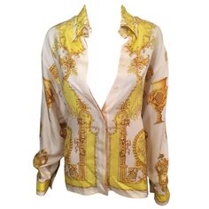 GIANNI VERSACE Vintage Sexy Plunging Decollete Silk Shirt Top IT 44 Versace vintage long sleeve blouse featuring print throughout, pointed collar and concealed button closures at front. About Versace: Founded in 1978 by the late Gianni Versace, this Italian design house specializes in sizzling glamour. Gianni's sister, Donatella Versace, has designed the label since 1997, creating luxuriously sexy dresses and separates. The line also includes shoes and a range of fragrances. Versace Blouse, Embellished Crop Top, Versace Vintage, Woman Casual, Versace Dress, Versace Couture, Printed Silk Shirt, Printed Silk Blouses, Vintage Versace