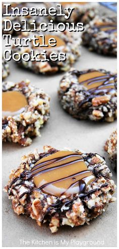 chocolate turtle cookies with caramel drizzle on top and more cookies in the background