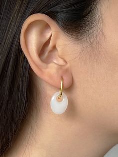 Jade Collection 2023 – Gabi The Label Elegant White Jade Earrings, White Gold Plated Tarnish Resistant Earrings, Elegant White Jade Jewelry, White Jade Dangle Jewelry, White Plated Earrings For Gift, White Oval Minimalist Earrings, Minimalist White Oval Earrings, Modern Gold Jade Jewelry, White Jade Earrings For Gift