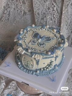 there is a cake with blue decorations on it