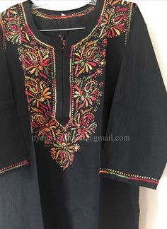 "Comfortable 100% Pure cotton blouse with multicolor embroidery. Length: 35inches \"Embroidery Design May Vary\"" Bohemian Multicolor Blouse For Eid, Festive Tunic With Floral Embroidery For Navratri, Festive Floral Embroidered Tunic For Navratri, Festive Floral Embroidery Tunic For Navratri, Chikankari Embroidery Top For Festivals, Multicolor Long Sleeve Kurta For Festivals, Festival Chikankari Embroidered Top, Festive Multicolor Top With Chikankari Embroidery, Traditional Long Sleeve Embroidered Top For Navratri