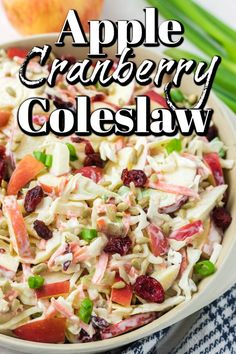 an apple cranberry coleslaw salad in a bowl