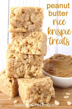 peanut butter rice krispy treats stacked on top of each other with a bowl of peanut butter in the background