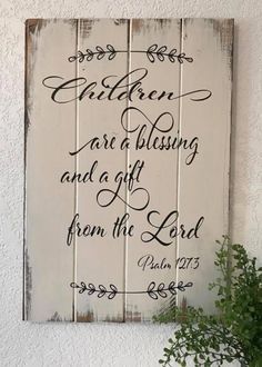 a wooden sign that says children are blessing and a gift from the lord