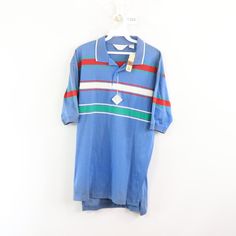 Vintage 80s Striped Color Block Short Sleeve Polo Shirt Polo Shirt New With Tags Mens Size Large Measurements Are: 22 Inches Underarm To Underarm 27 Inches Top To Bottom Blue Striped Cotton Check Out My Other Items In My Store! T283 Retro Short Sleeve Polo Shirt For Spring, Vintage Blue Collared T-shirt, Retro Blue Collared Top, Blue Retro Collared Tops, Blue Collared Retro Tops, Retro Spring Polo Collar Tops, Retro Cotton Polo Shirt For Spring, Retro Collared T-shirt For Spring, Retro Blue Polo Collar T-shirt